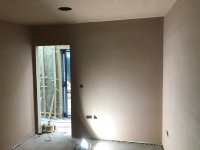 Newly plastered wall is bumpy.