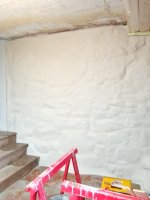 DIY in Galicia, Northern Spain. Smooth finish a rough stone wall but keep the outline of the stones.