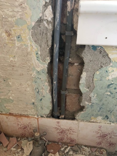 Advice on plastering shower feed pipe.