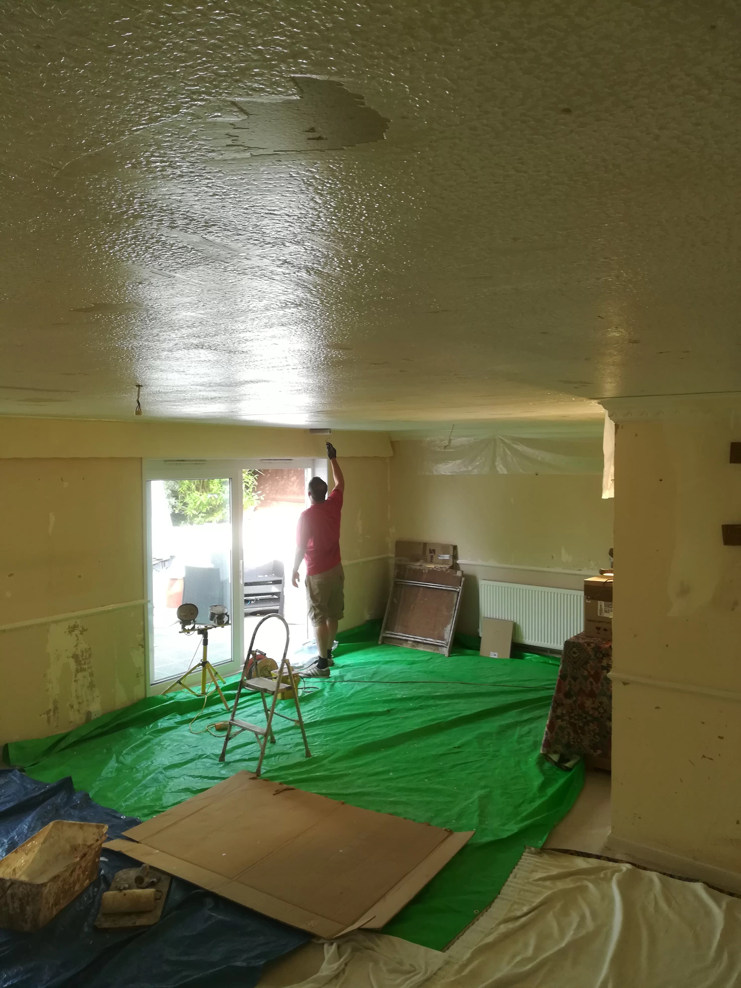 Plastering over artex