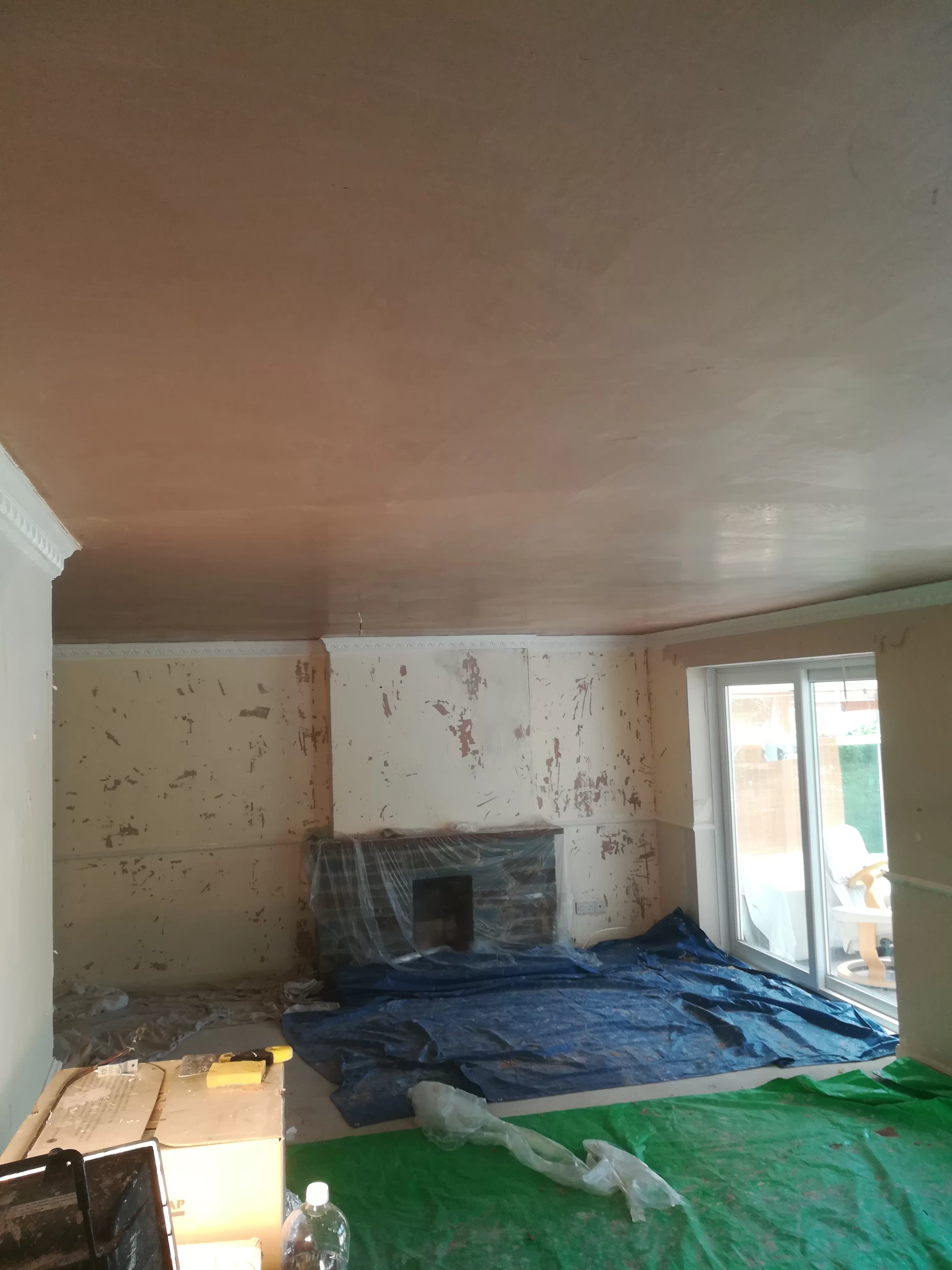 Plastering over artex