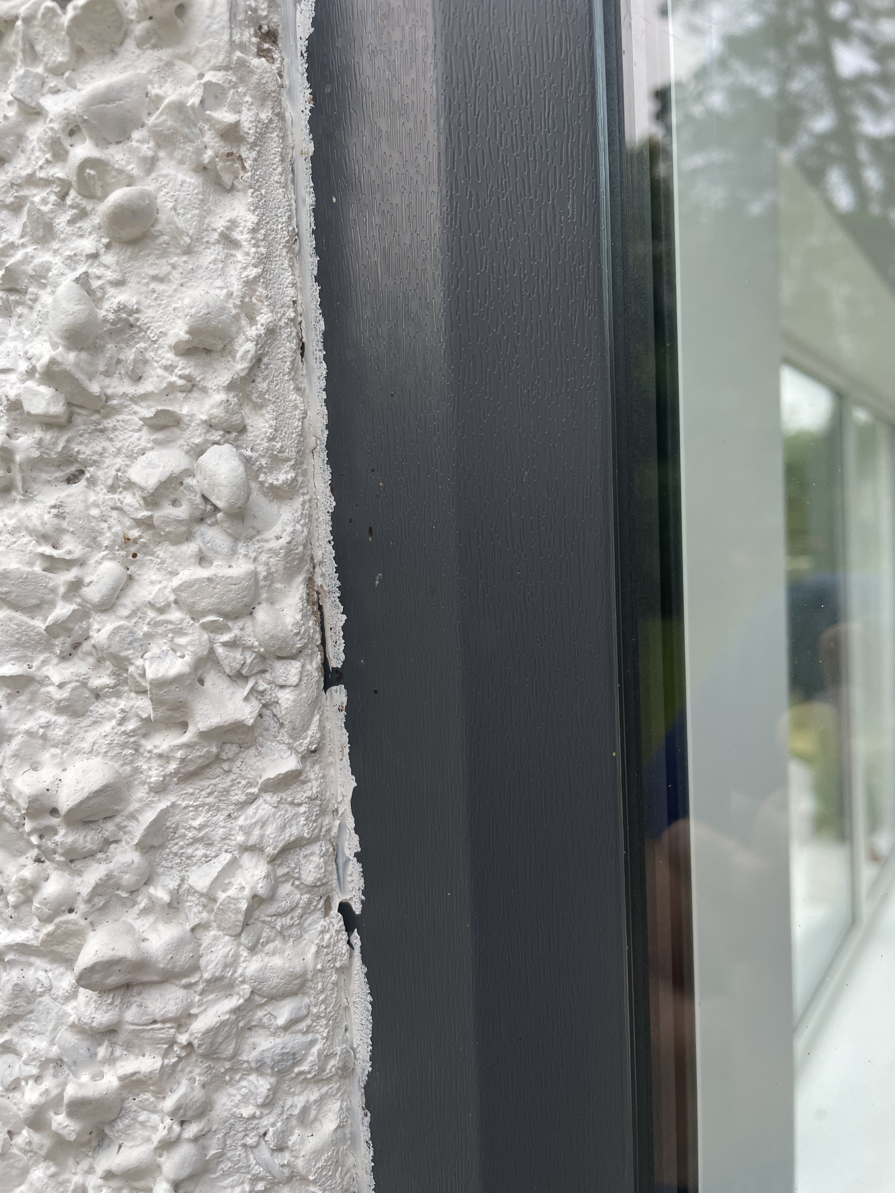 Don't look - Horror Story - Roughcast falling off around UPVC windows