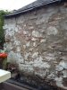 Lime render over a damp wall?