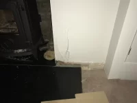 plaster cracking around wood burner