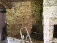 Plastering upstairs stone wall