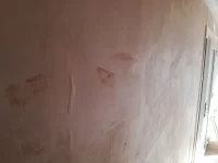 Should plasterer have removed socket/switch covers?