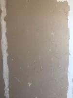 Skimming over torn plasterboard paper