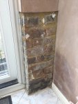 Bonding plaster on to a conservatory brick wall