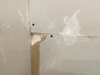 New plasterboard, breaks and paper tears from installation