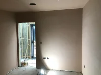 Newly plastered wall is bumpy.