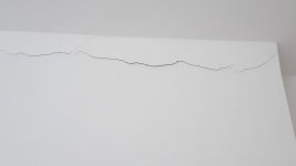 New ceiling and cracks forming along edge of wall