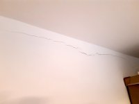 New ceiling and cracks forming along edge of wall