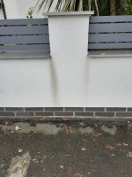 Stain on newly rendered wall