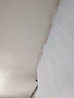 Cracked asbestos artex ceiling