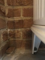 Help! Browning/Bonding Adhesive used on stone hearth around log burner??