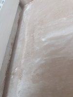 My plasterer skimmed OVER wallpaper - HELP