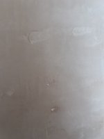 My plasterer skimmed OVER wallpaper - HELP