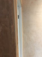 Is this plastering any good? Halfway through a job and not sure wether to approach builder.