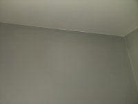 Slightly cracking plaster top corner or external wall in living room