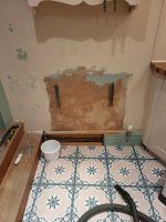 Plastering behind radiator