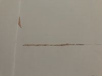 Straight line cracks in paint - is it a problem with underlying plaster